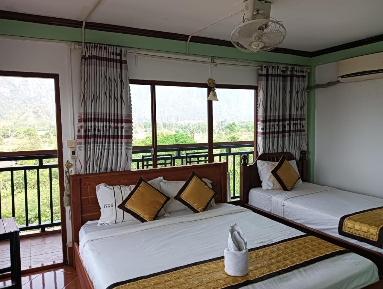 Bountang Riverside Hotel Vang Vieng Bagian luar foto